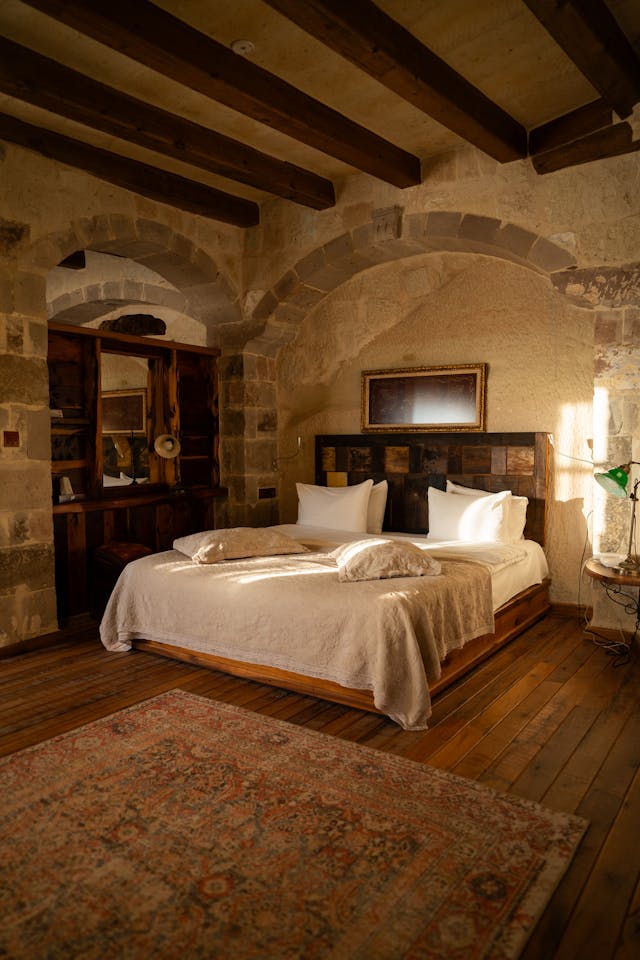 Brown bedroom with multi-colored brown headboard