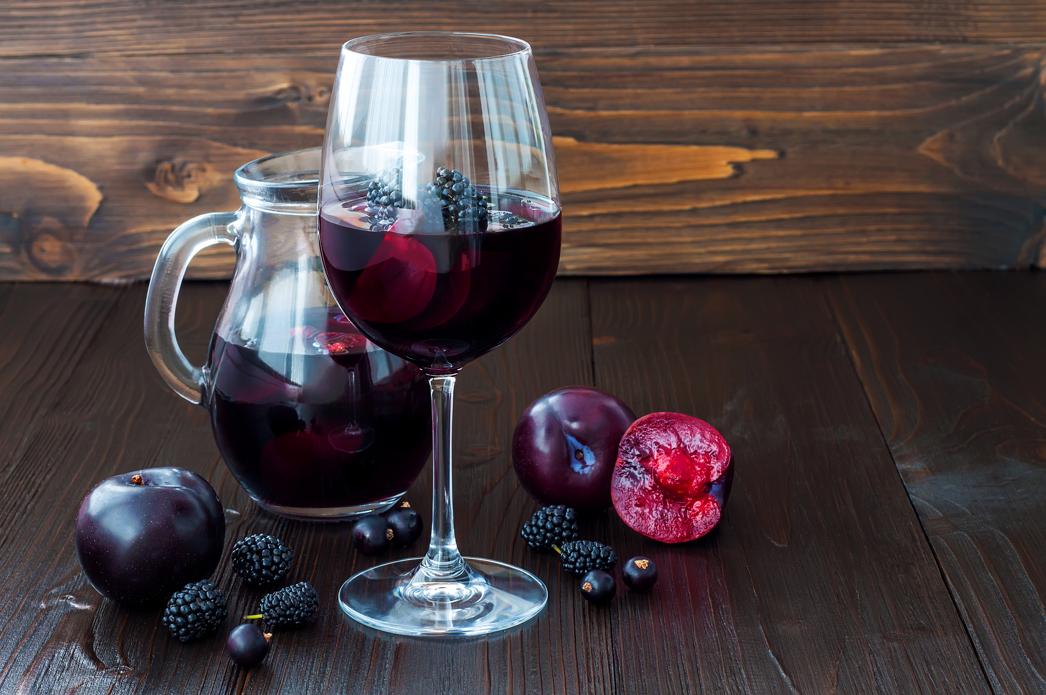 Black sangria with plums and berries.