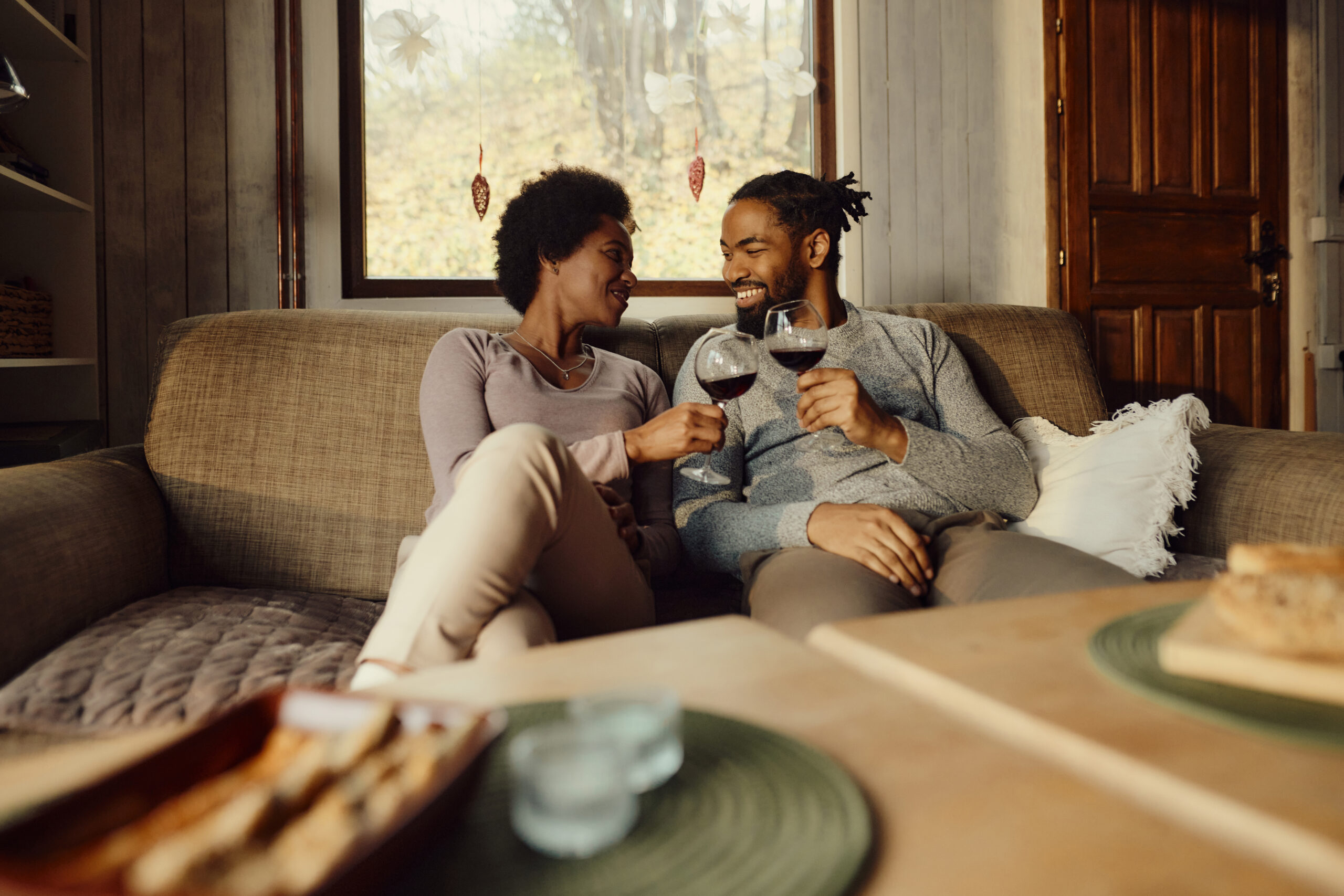 couple drinking red wine in winter