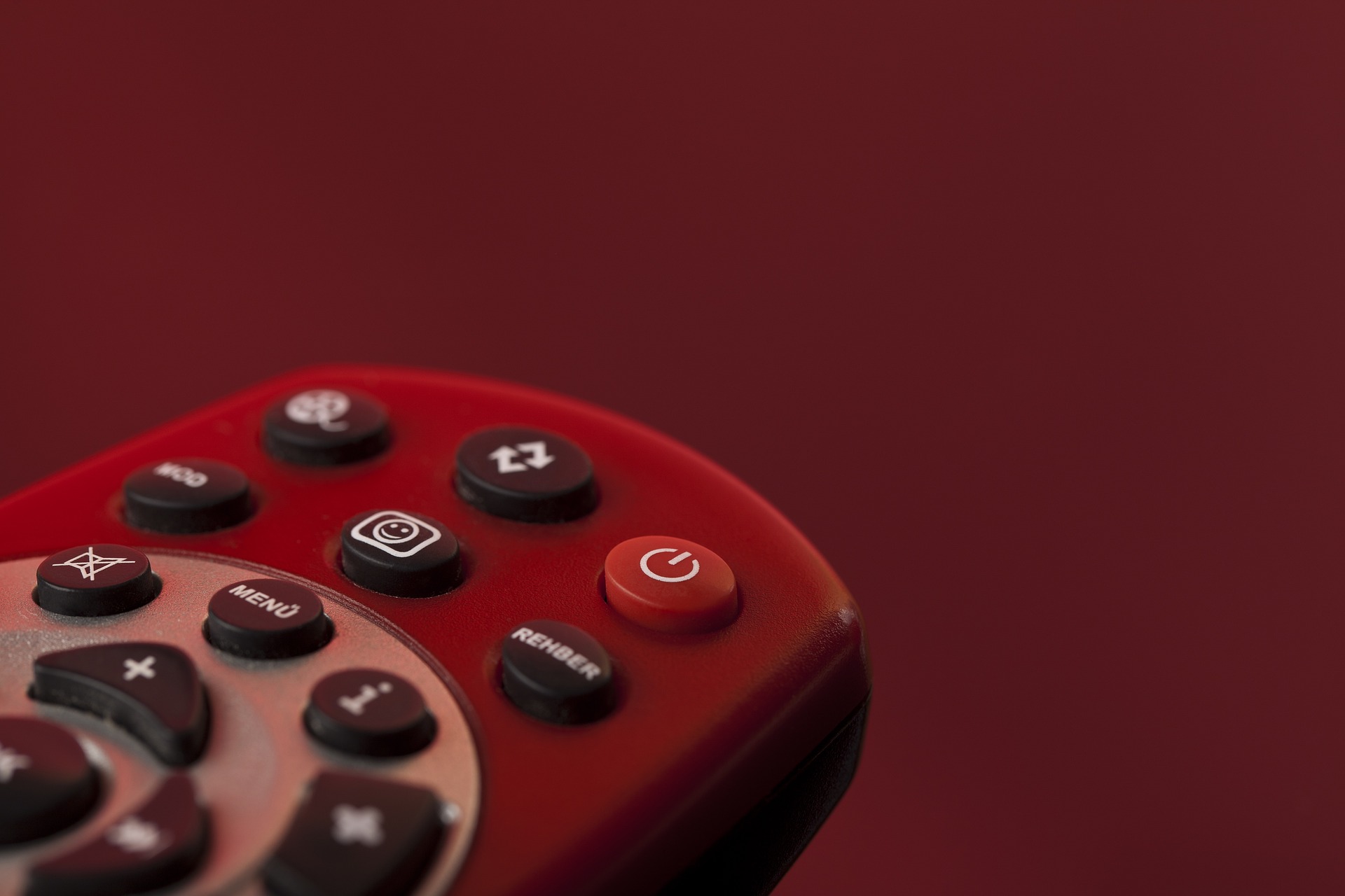 Red background with remote control