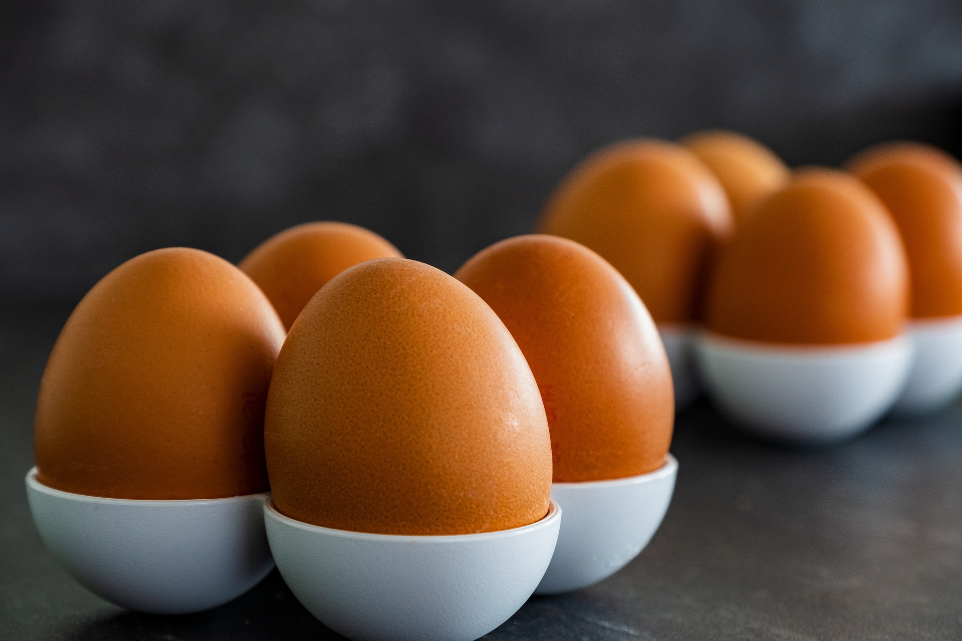 Boiled eggs in small bowls