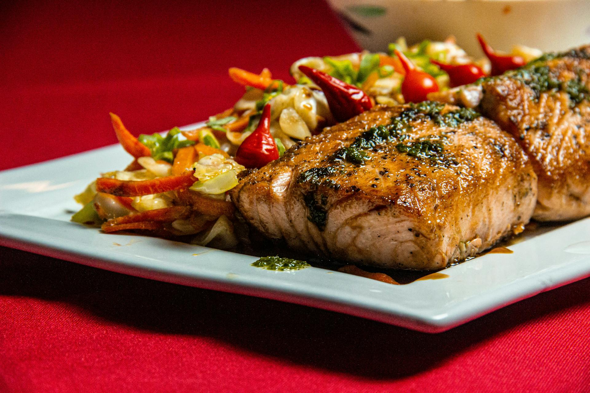 Grilled salmon on a plate with vegetables