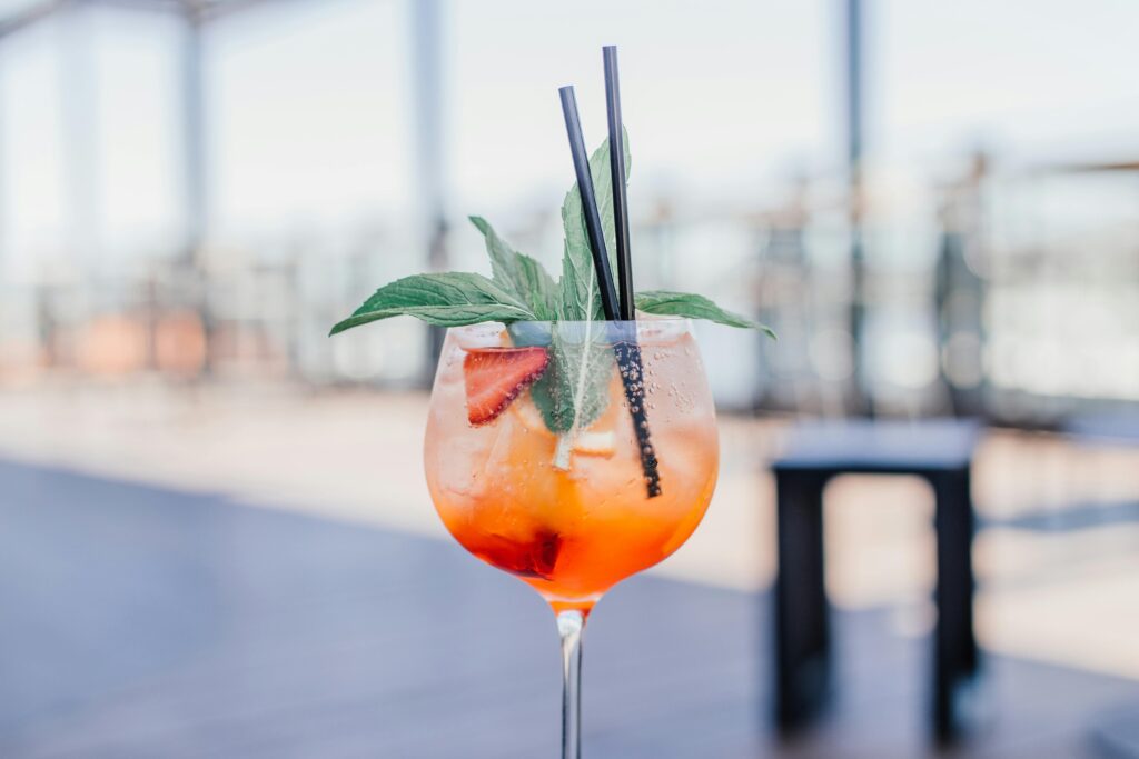 a spritzer mocktail on display at a waterfront restaurant