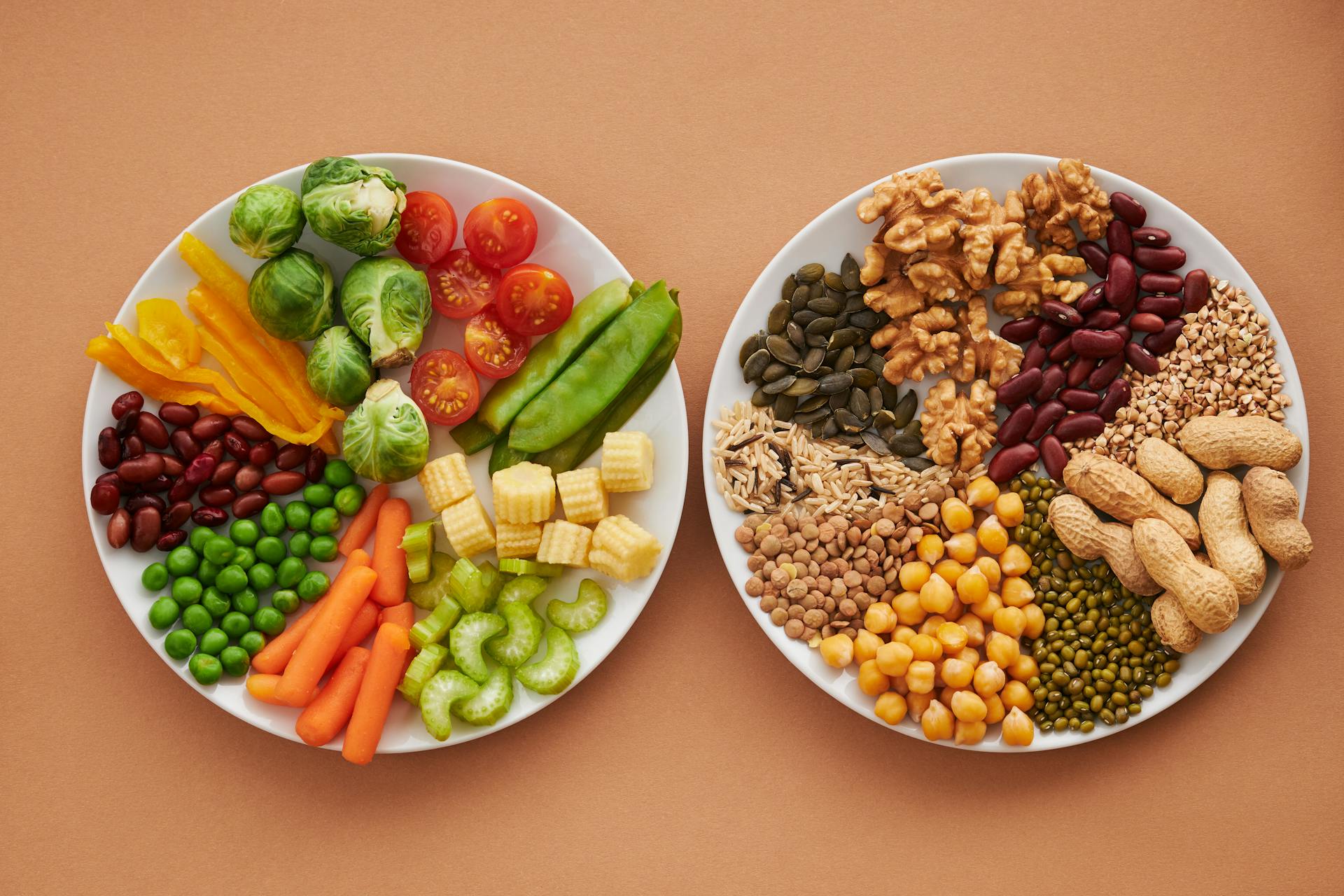 Mix of vegetables, nuts and grains on two plates
