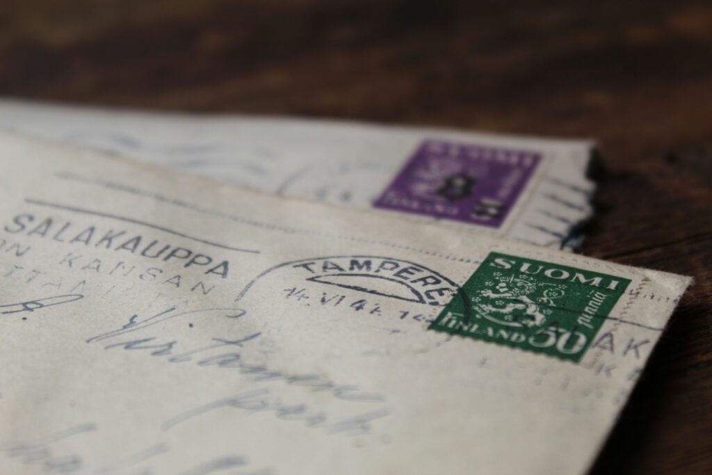How To Address an Envelope pictured: postage stamp