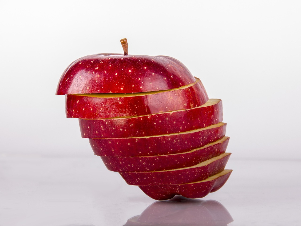 Sliced apple positioned diagonally