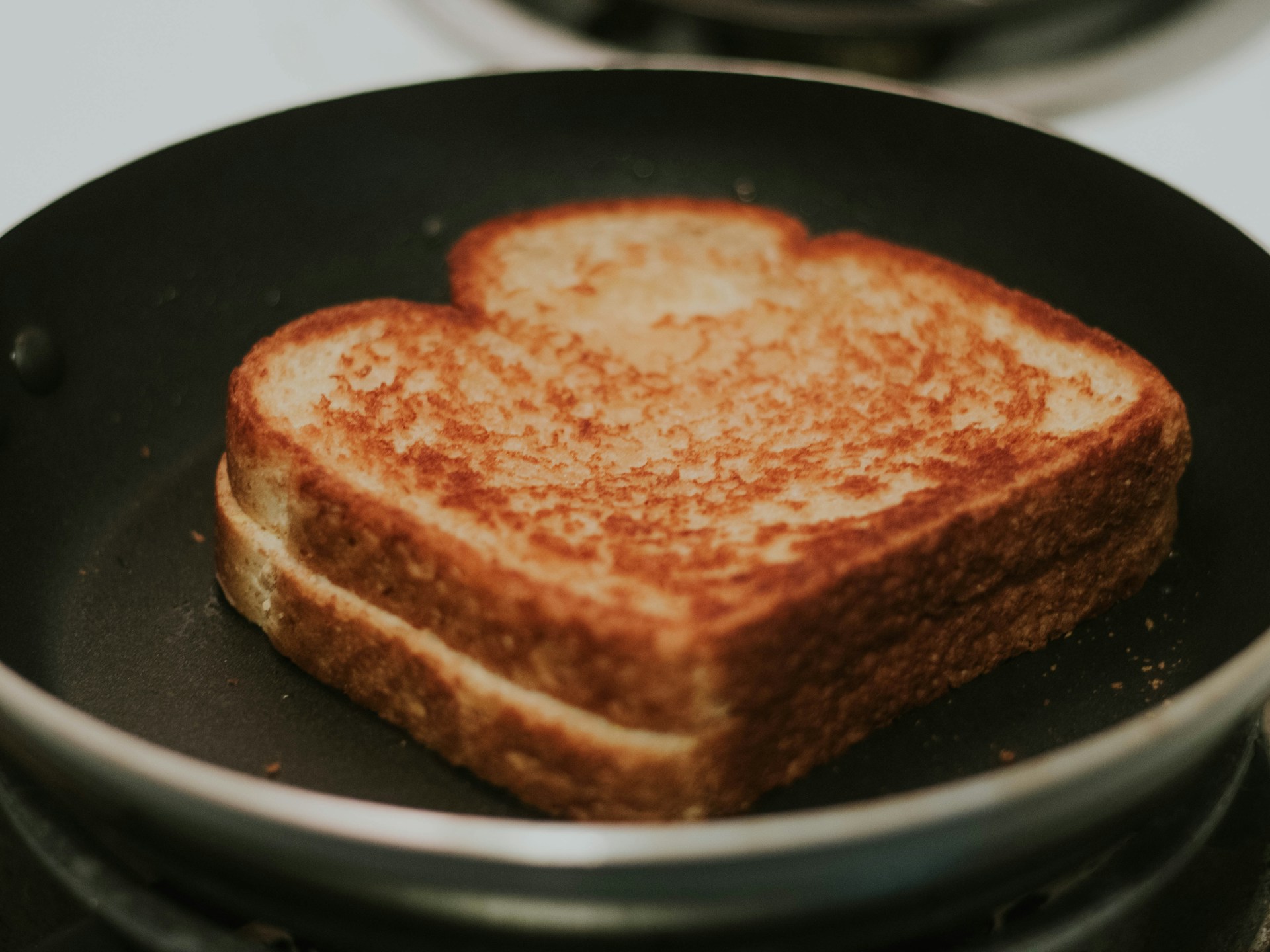 Grilled cheese sandwich in a pan