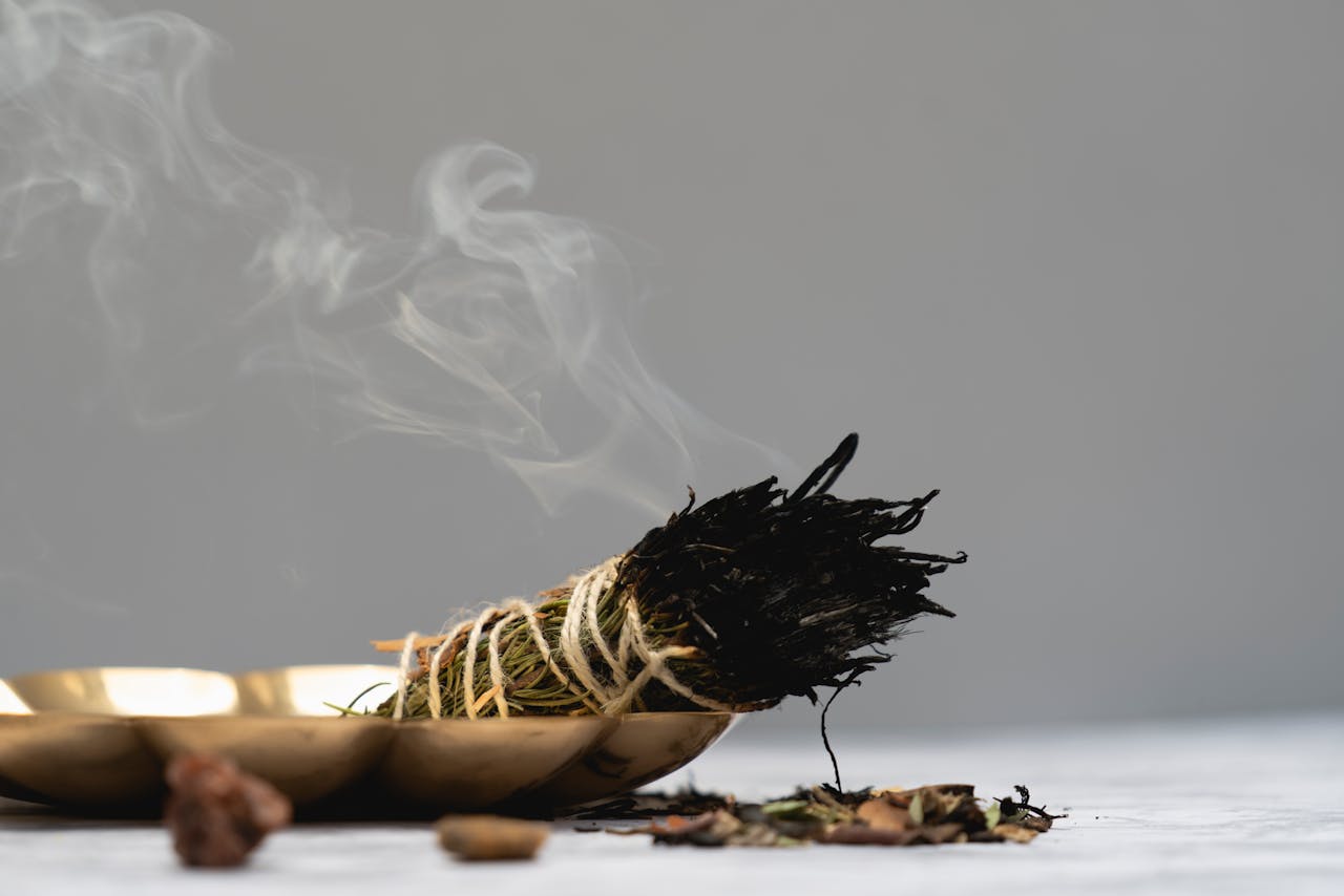 Burning sage on a plate