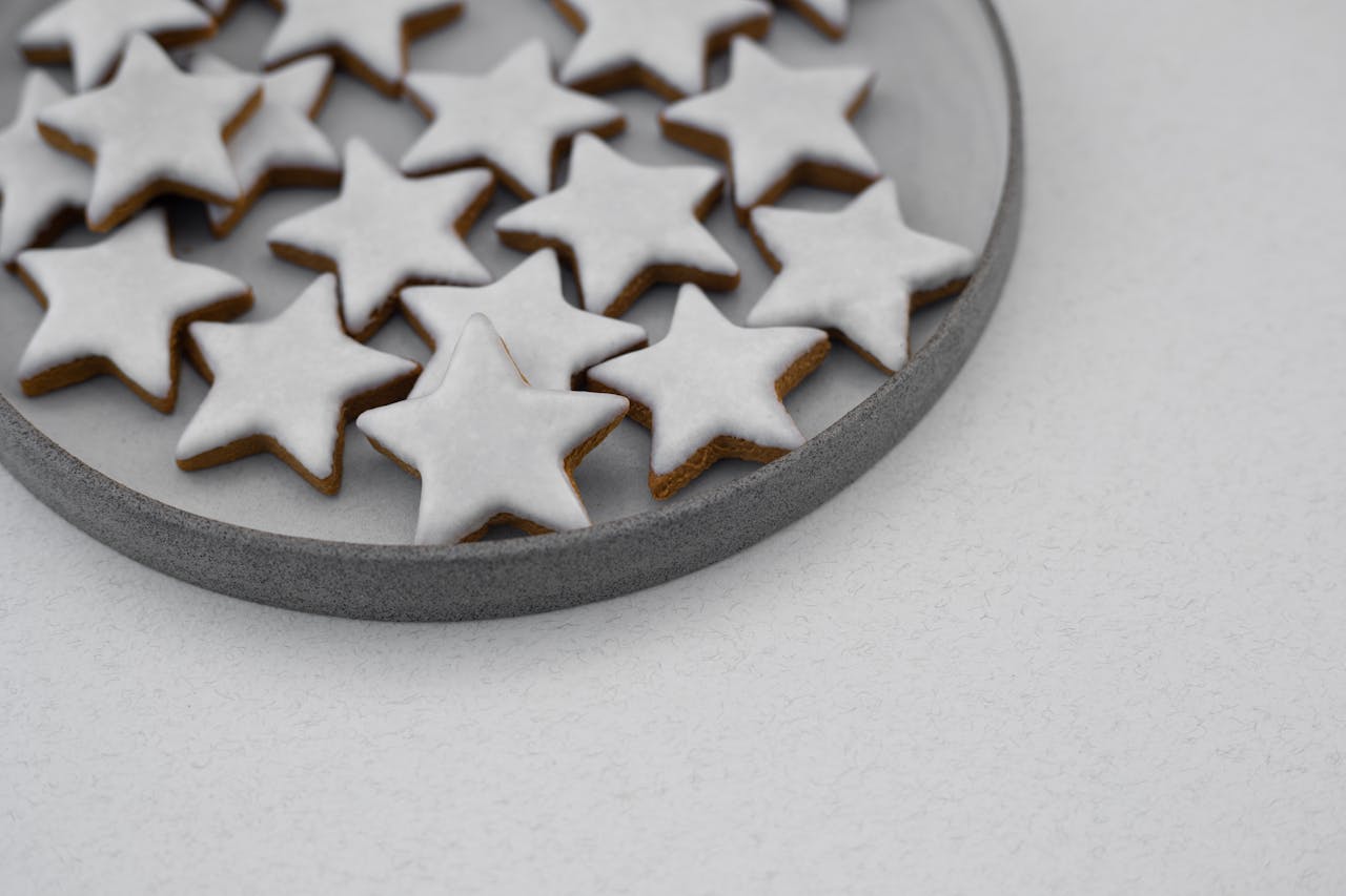 Star-shaped sugar cookies with white icing 