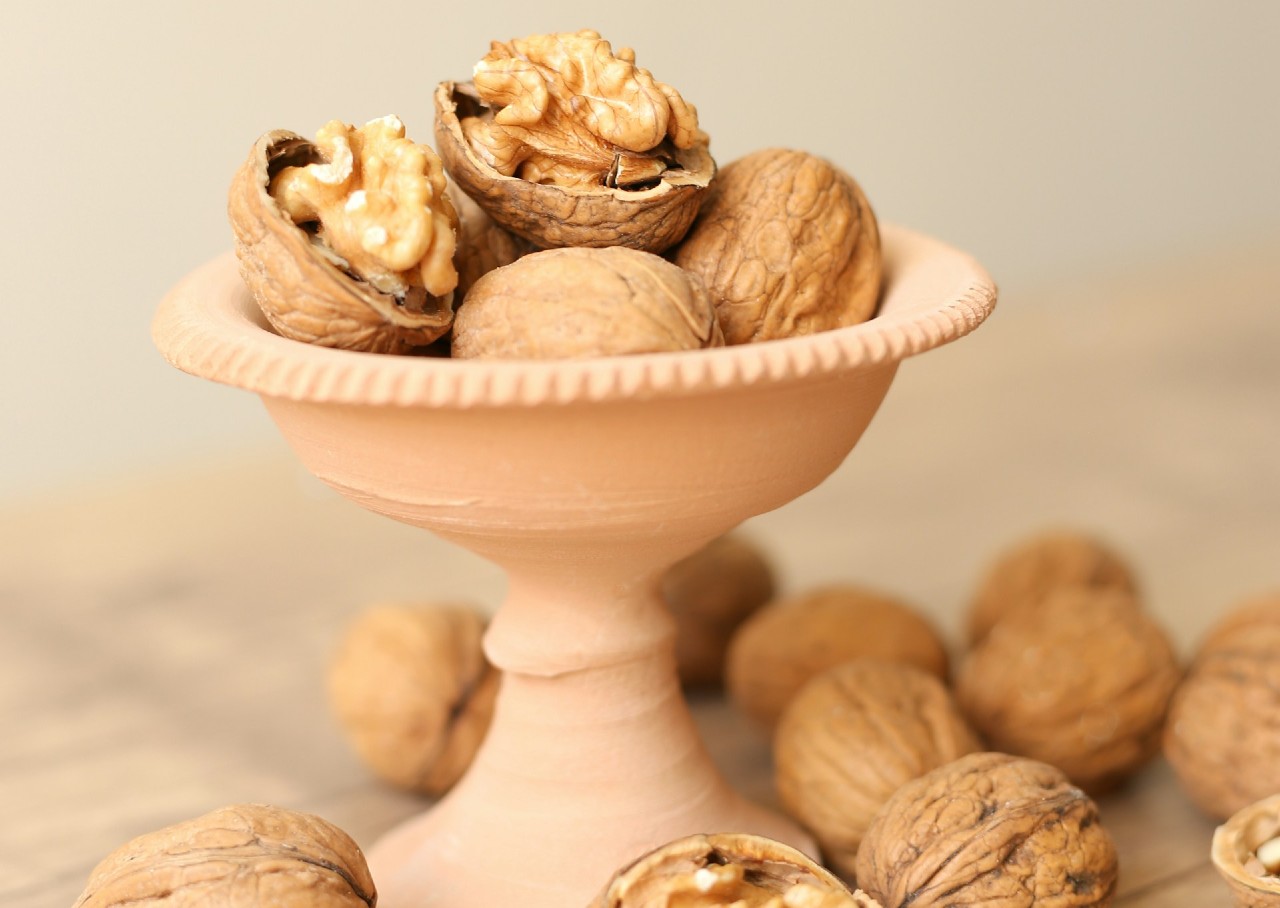 Shelled walnuts on a serving tray