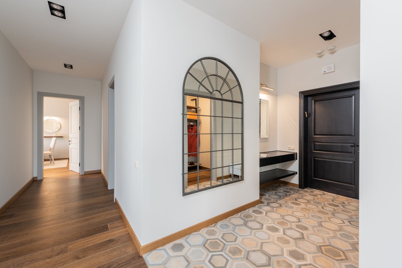Hallway area with window-shaped mirror