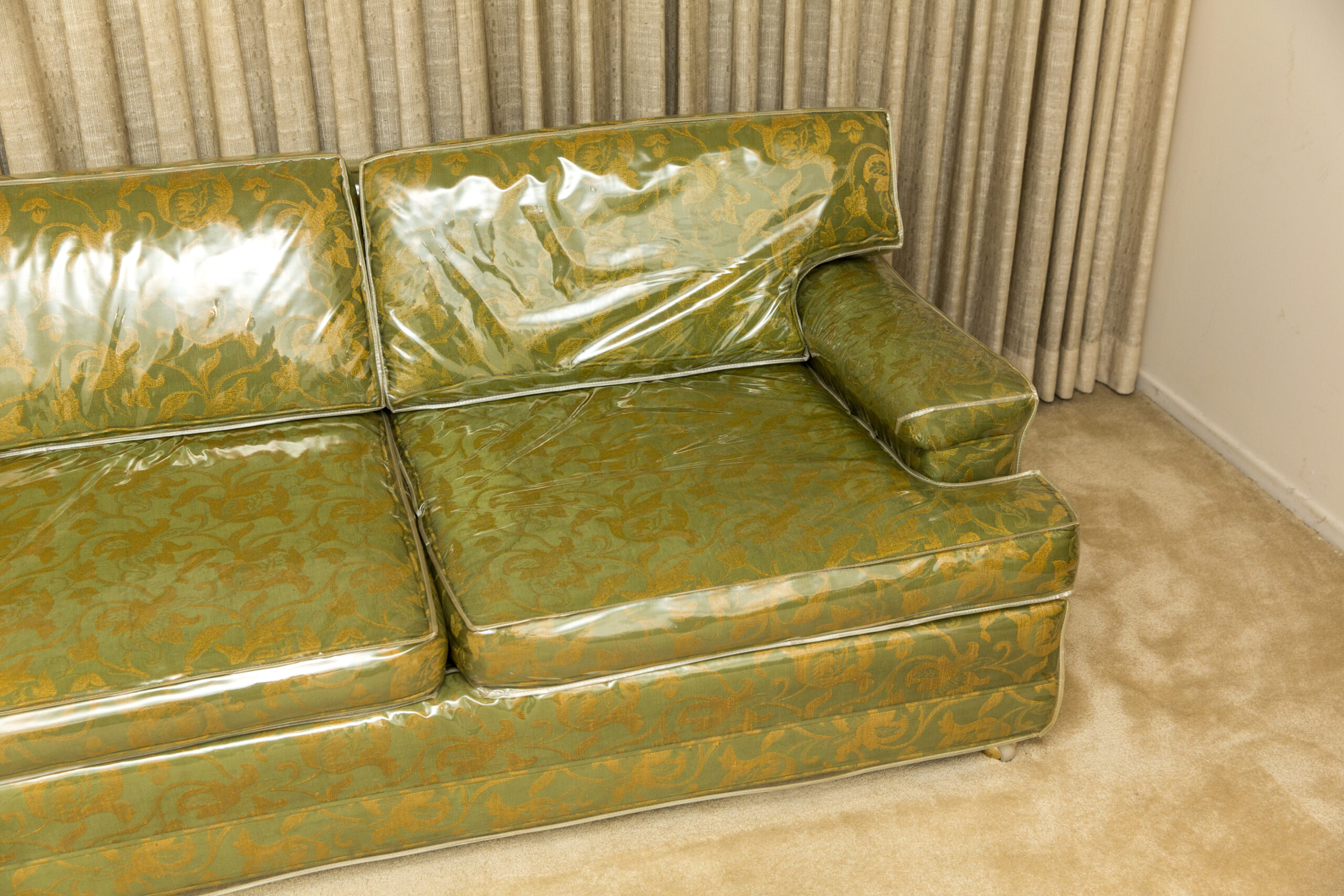 plastic covered couch